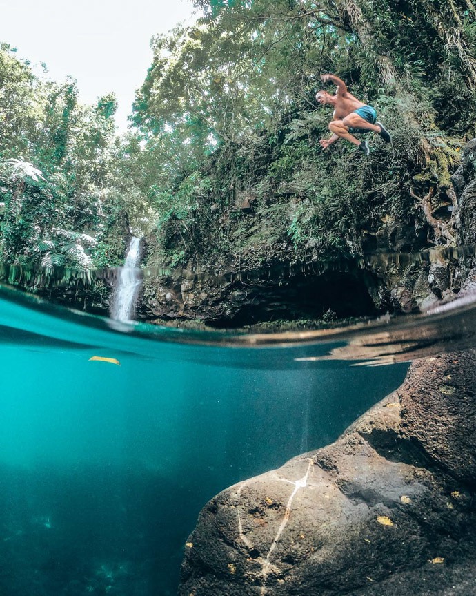 10 top things to do in Samoa - Tom jumping into Afu Aua Waterfall pool