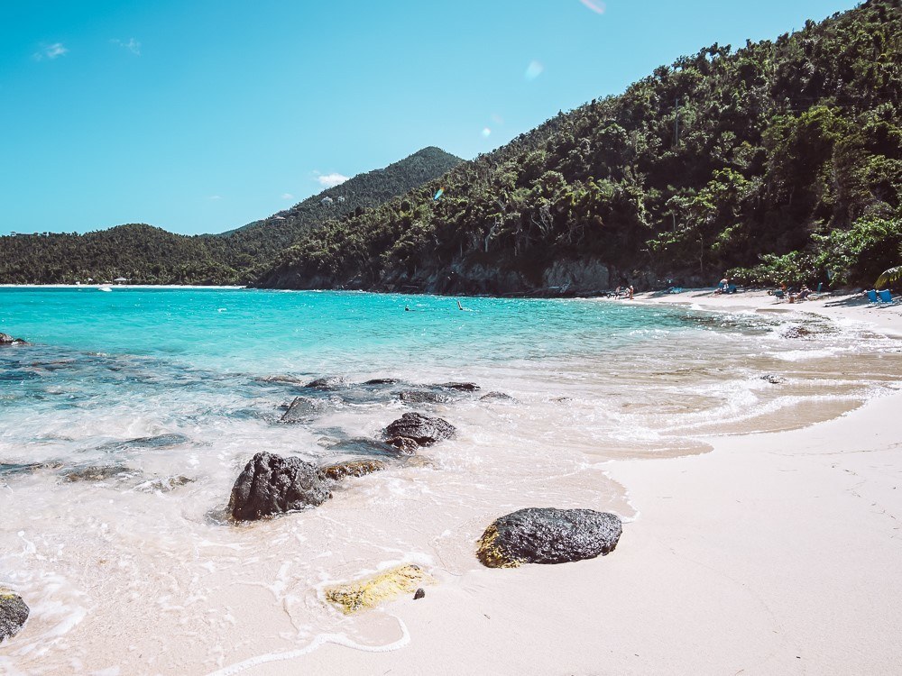 rocks against turquoise water at hawksnest bay beach in virgin islands national park